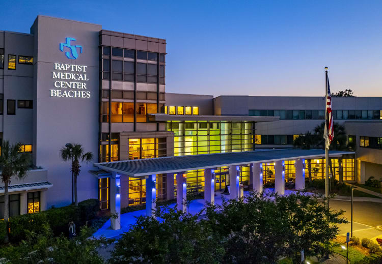 night time exterior photo of Baptist Medical Center Beaches.